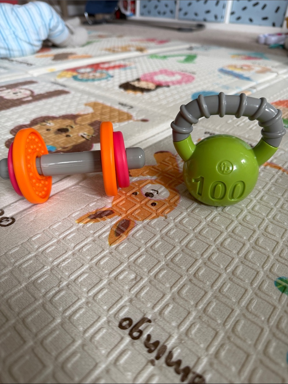 Green and Orange Infant Rattle Kettlebell and Weight Toy Set - Baby Sensory Play